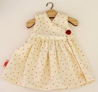 kleed wit met rode bolletjes 