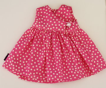 kleed roze met witte bolletjes